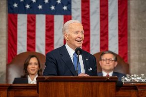 President Joe Biden presents copies of his speech to Vice President Kamala Harris and House Speaker Mike Johnson before delivering his State of the Union address, Thursday, March 7, 2024, in the House Chamber at the U.S. Capitol in Washington, D.C.  (Official White House Photo by Adam Schultz)
