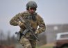 A member of the US Federal Bureau of Investigation's Milwaukee Special Weapons and Tactics team participtes in urban assault course training at range 41 at Fort McCoy Wis. on 27 April 2016.  Fort McCoy is one of three Total Force Training centers in the United states and trains more than 100,000 US military personel each year.  Many of the training facilities are also available to federal, state and local law enforcement.  Photo by Jamal Wilson