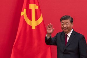 BEIJING, CHINA - OCTOBER 23: General Secretary and Chinese President, Xi Jinping waves as he leaves after speaking at a press event with members of the new Standing Committee of the Political Bureau of the Communist Party of China and  Chinese and Foreign journalists at The Great Hall of People on October 23, 2022 in Beijing, China. (Photo by Kevin Frayer/Getty Images)