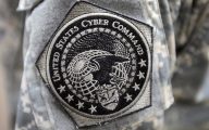 U.S. Army soldier proudly wears the United States Cyber Command patch during exercise “Cyber Guard 2015”.  The two-week “Cyber Guard 2015” exercise was held at Suffolk, Virginia and was attended by partners from across government, academia, international coalition, and industry. The purpose of the exercise was to perform operational and interagency coordination as well as tactical level operations to protect, prevent, mitigate, and recover from a cyberspace incident during “Cyber Guard 2015”.  (Department of Defense Photo by Marvin Lynchard)