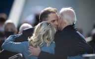 President Joe Biden hugs his family during the 59th Presidential Inauguration ceremony in Washington, Jan. 20, 2021. President Joe Biden and Vice President Kamala Harris took the oath of office on the West Front of the U.S. Capitol. (DOD Photo by Navy Petty Officer 1st Class Carlos M. Vazquez II)