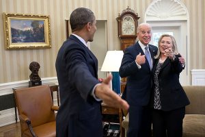 Jan. 30, 2012
"This is one of those rare instances where my presence indirectly became a part of this reaction from those pictured in the photograph. Secretary of State Hillary Clinton had just accidentally dropped all of her briefing papers onto the Oval Office rug and she, the President and Vice President all reacted in a way that indicated that surely I wouldn't get a photo of that to embarrass her. 
(Official White House Photo by Pete Souza)

This official White House photograph is being made available only for publication by news organizations and/or for personal use printing by the subject(s) of the photograph. The photograph may not be manipulated in any way and may not be used in commercial or political materials, advertisements, emails, products, promotions that in any way suggests approval or endorsement of the President, the First Family, or the White House.