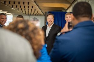 U.S. AIR FORCE ACADEMY, Colo. --  Tesla Inc. Chief Executive Officer Elon Musk poses for a photograph with U.S. Air Force Academy Cadets in Mitchell Hall during a tour hosted by Superintendent Lt. Gen. Richard Clark on April 7, 2022. Musk met with Academy senior leadership and delivered remarks to a crowd of cadets and faculty. (U.S. Air Force photo by Justin R. Pacheco)