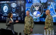 Vice President Kamala Harris speaks with Gen. Stephen Whiting, U.S. Space Command commander, and Lt. Gen. David Miller, Space Operations Command commander, at USSPACECOM’s headquarters, Peterson Space Force Base, Colorado, May 30, 2024. As the chairperson for the National Space Council, Harris advises and assists the President on the development and implementation of space policy and strategy. USSPACECOM, working with Allies and Partners, plans, executes, and integrates military spacepower into multi-domain global operations in order to deter aggression, defend national interests, and when necessary, defeat threats. (U.S. Space Command photo by Christopher DeWitt/Released)