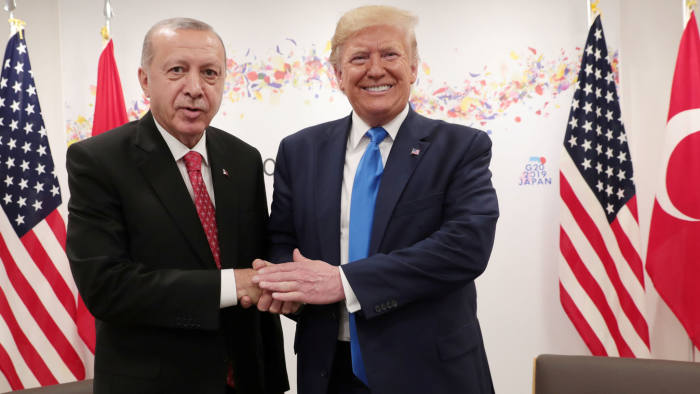 Turkey's President Tayyip Erdogan shakes hands with U.S. President Donald Trump during their bilateral meeting on the sidelines of the G20 leaders summit in Osaka, Japan, June 29, 2019. Murat Cetinmuhurdar/Turkish Presidential Press Office/Handout via REUTERS ATTENTION EDITORS - THIS PICTURE WAS PROVIDED BY A THIRD PARTY. NO RESALES. NO ARCHIVE